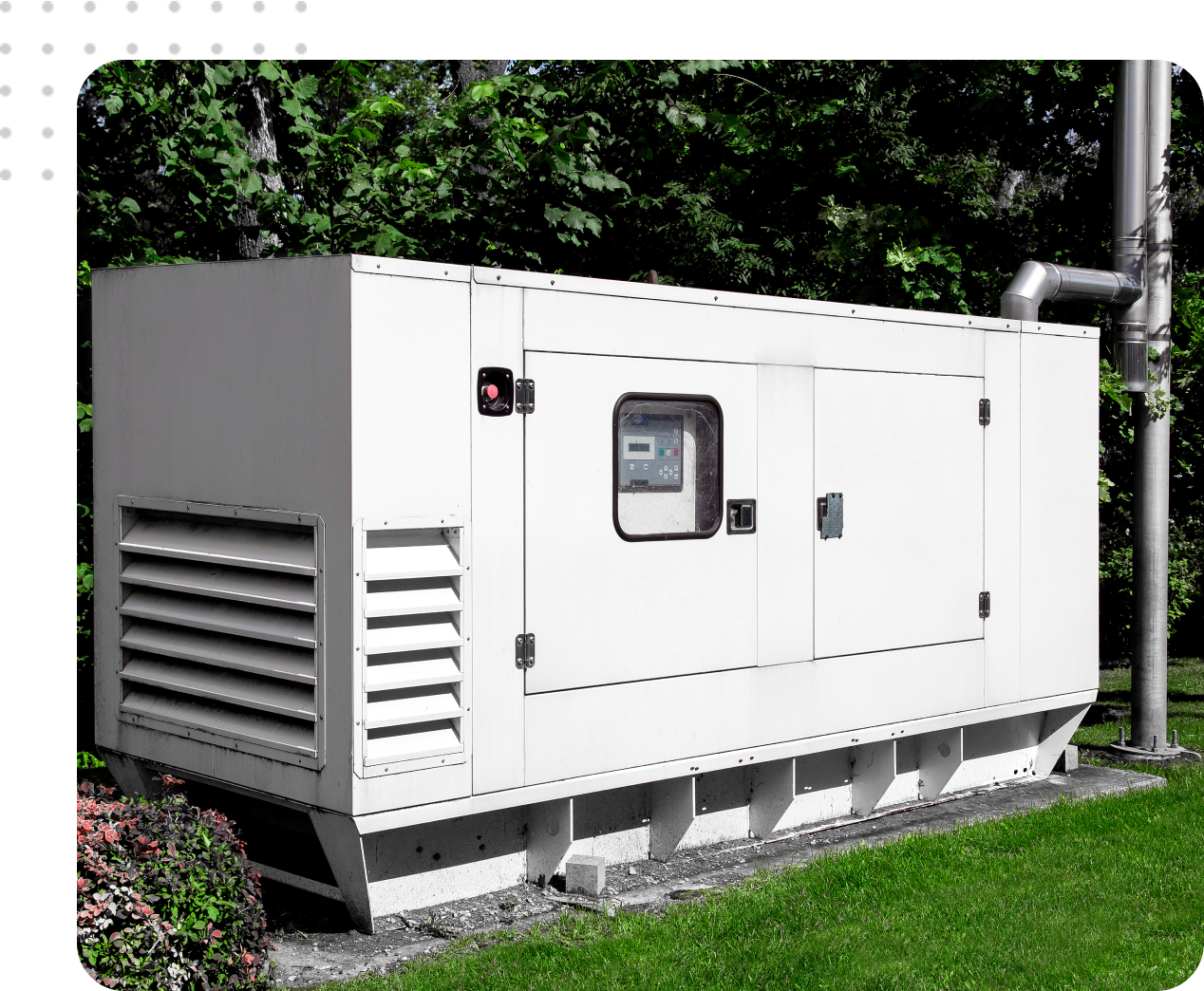 White industrial generator outdoors.