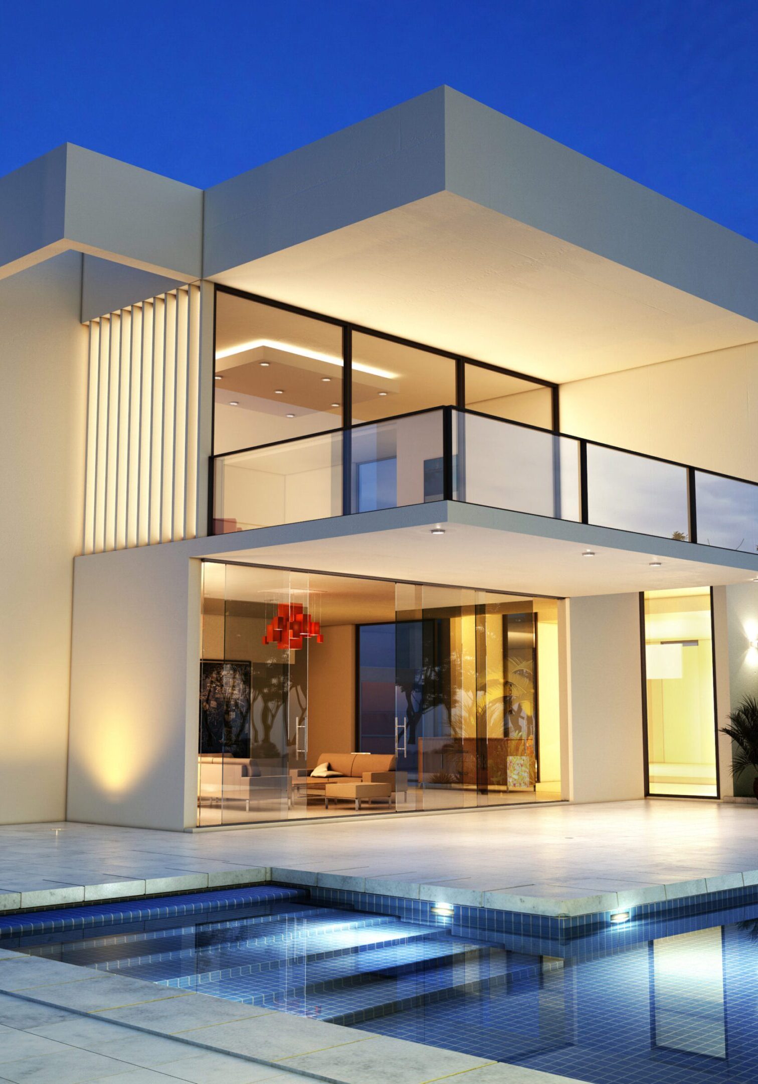 Modern house with pool at night.